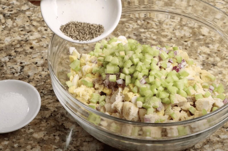 seasoning the salad 